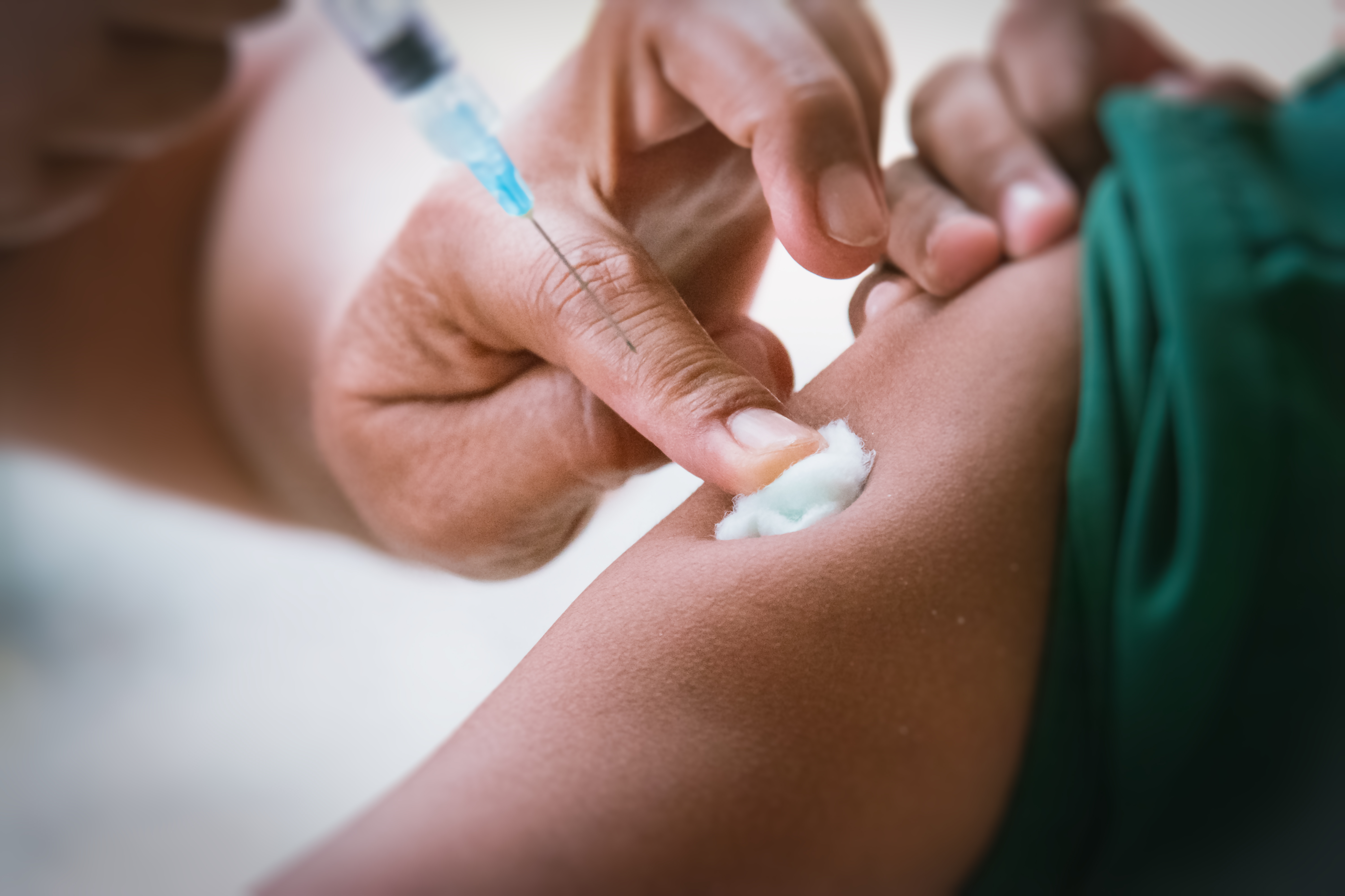 Doctor,Inject,Vaccine,To,Patient.